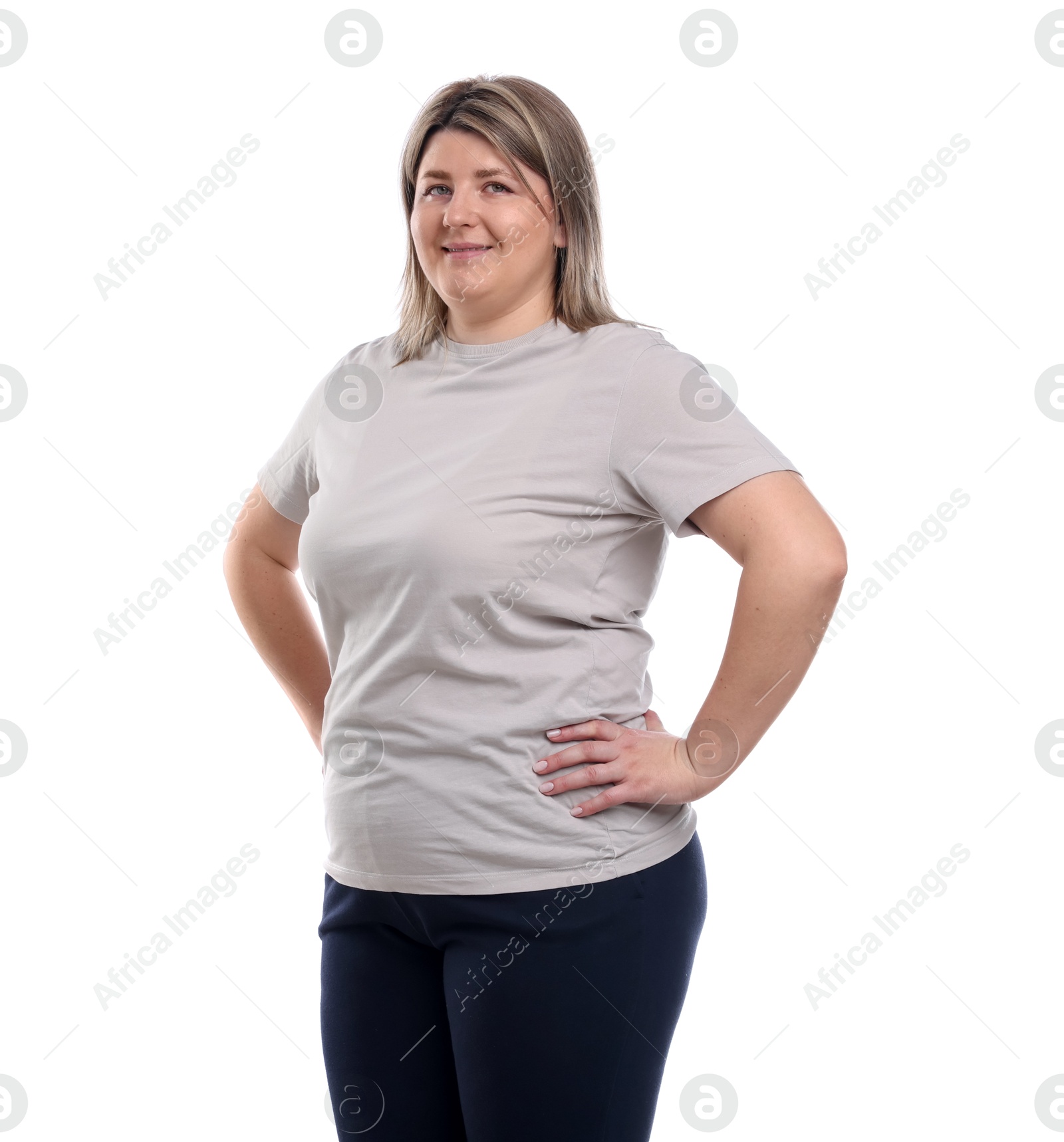Weight loss. Plus size woman on white background Photo of Weight loss. Plus size woman on white background