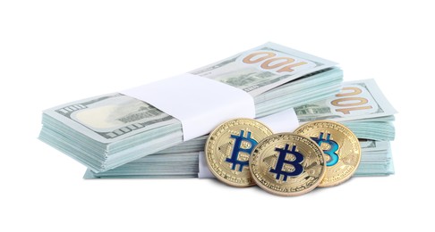 Photo of Cryptocurrency. Bitcoins and dollar banknotes isolated on white