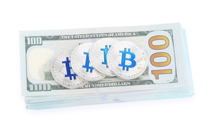 Photo of Cryptocurrency. Bitcoins and dollar banknotes isolated on white, top view