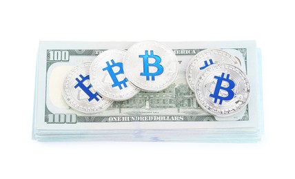 Photo of Cryptocurrency. Bitcoins and dollar banknotes isolated on white, top view