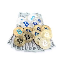 Photo of Cryptocurrency. Bitcoins and dollar banknotes isolated on white