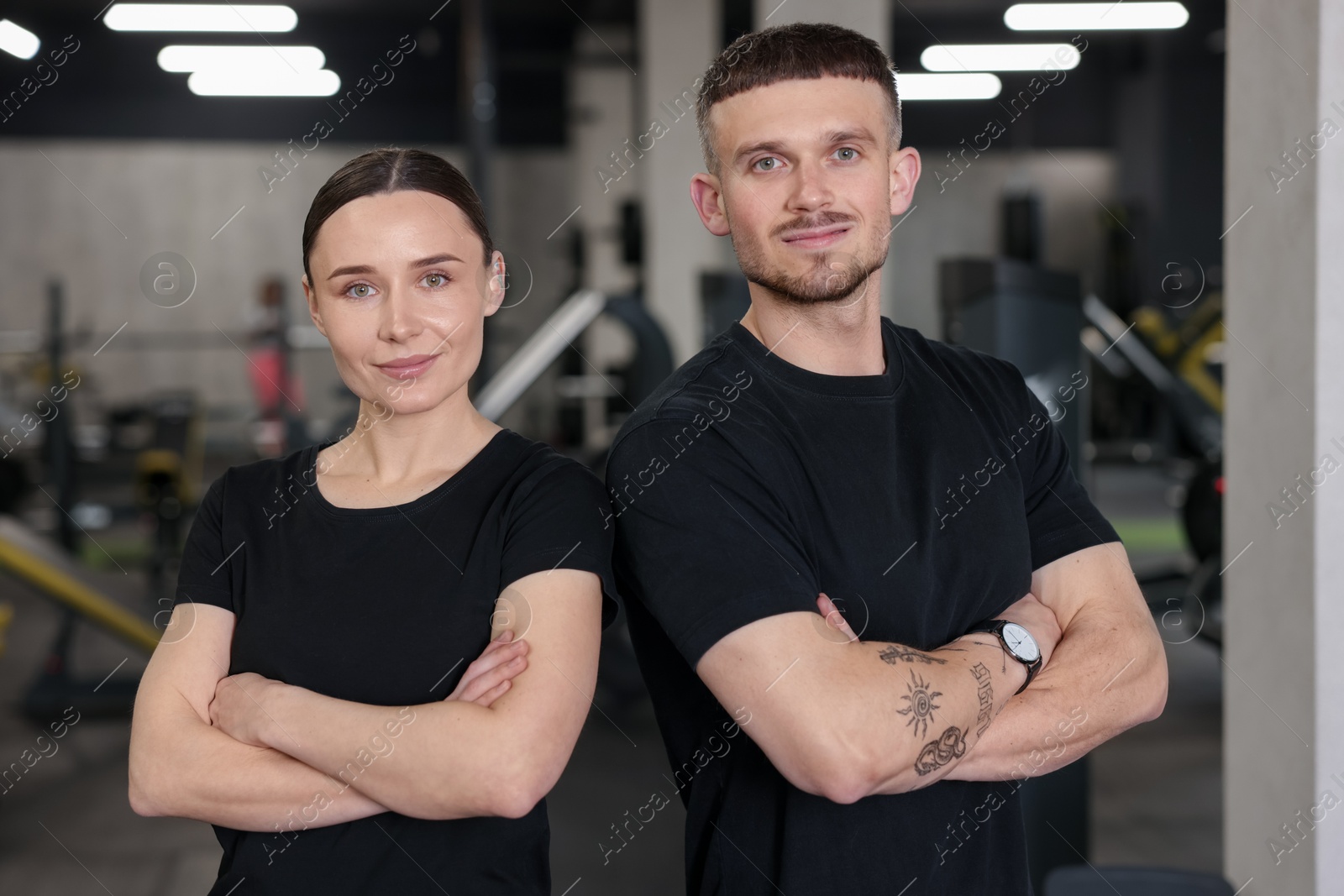 Portrait of professional personal trainers in sport center Photo of Portrait of professional personal trainers in sport center