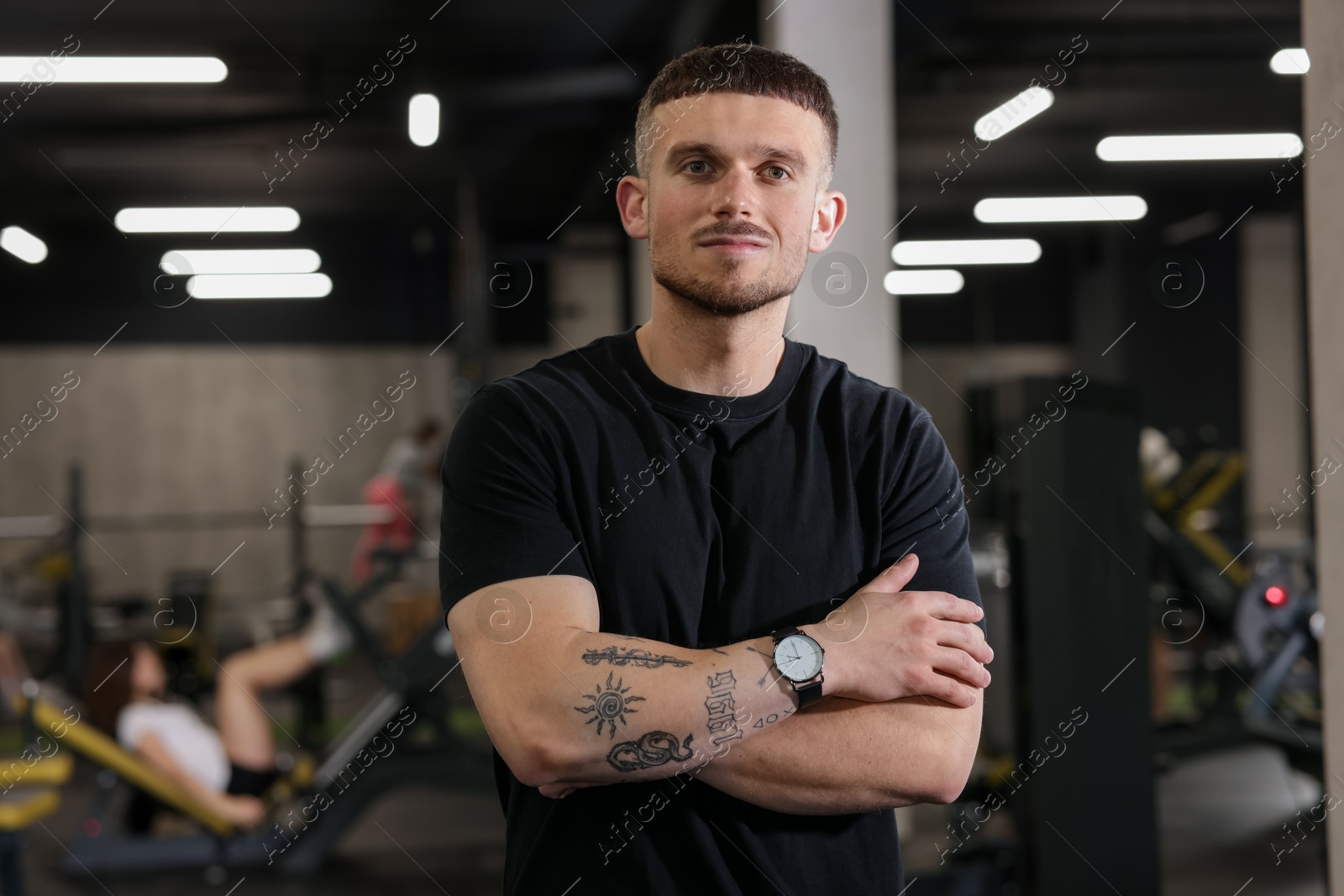 Portrait of professional personal trainer in sport center Photo of Portrait of professional personal trainer in sport center