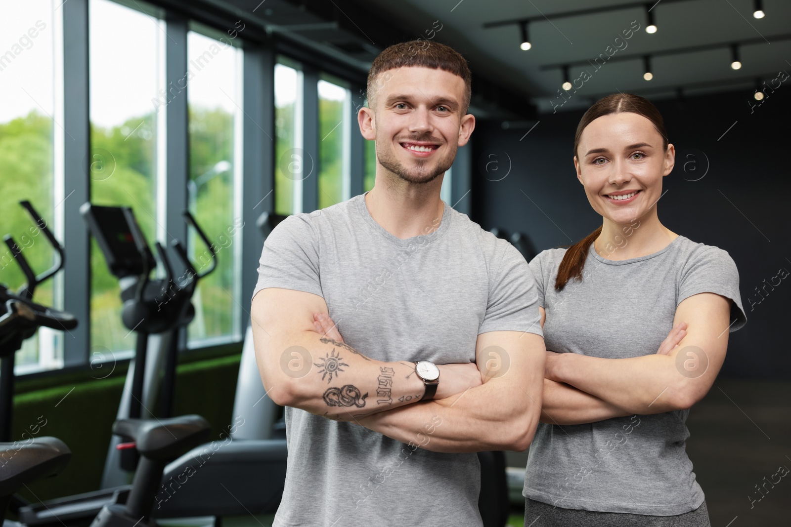 Portrait of personal trainers in sport center Photo of Portrait of personal trainers in sport center