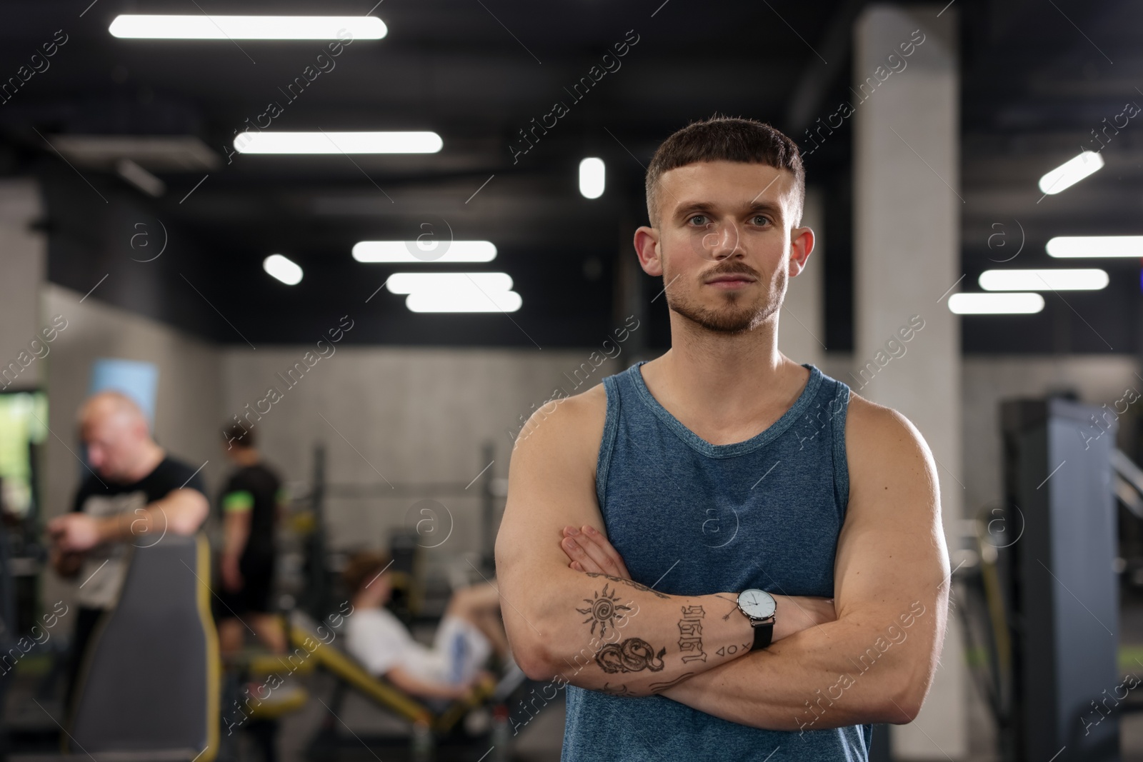 Portrait of professional personal trainer in gym. Space for text Photo of Portrait of professional personal trainer in gym. Space for text