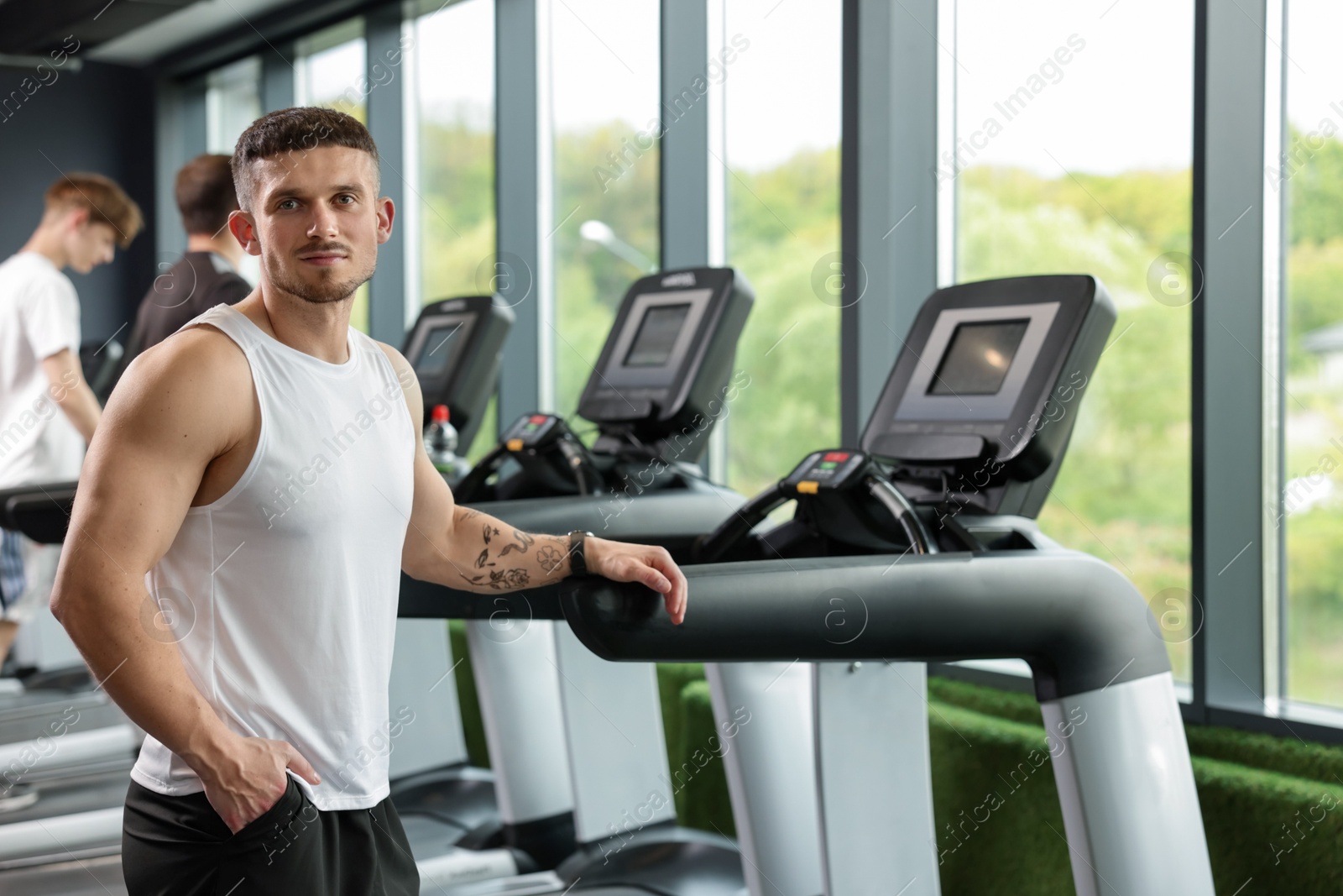 Portrait of professional personal trainer in sport center Photo of Portrait of professional personal trainer in sport center