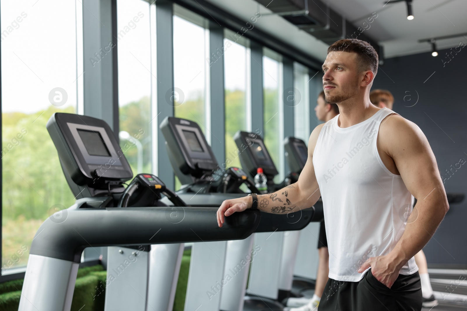 Portrait of professional personal trainer in sport center Photo of Portrait of professional personal trainer in sport center