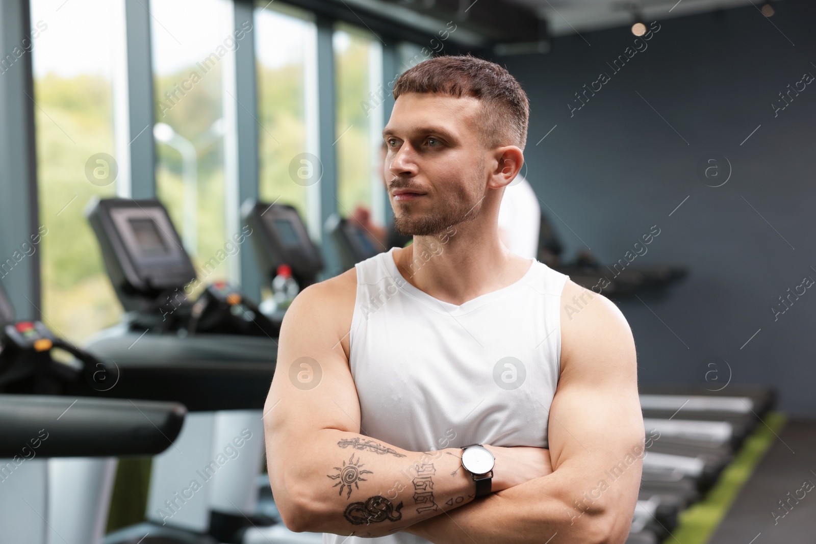 Portrait of professional personal trainer in sport center Photo of Portrait of professional personal trainer in sport center