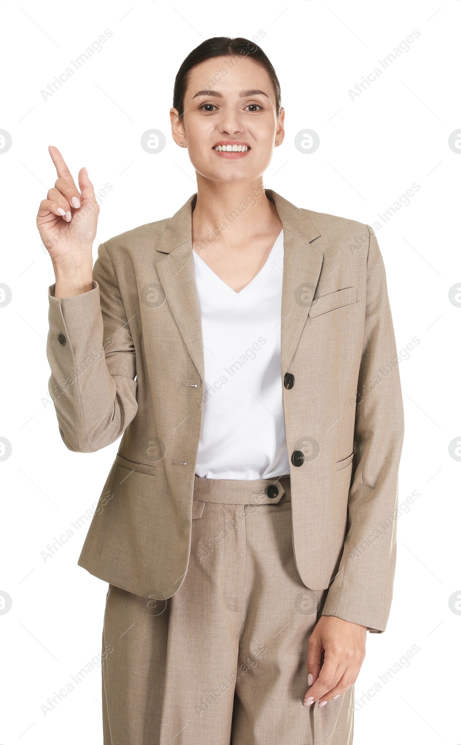 Photo of Confident business woman in suit pointing at something on white background