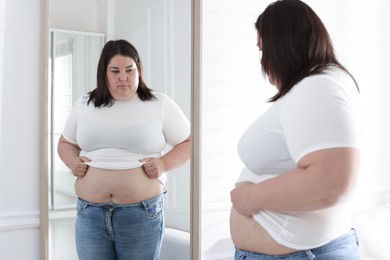Photo of Woman with excessive belly fat near mirror indoors. Overweight problem