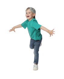 Photo of Happy little boy dancing on white background