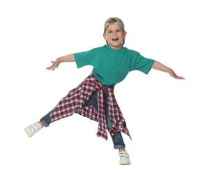 Photo of Happy little boy dancing on white background