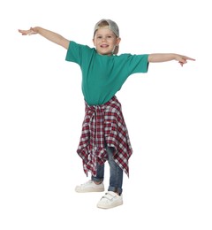 Photo of Happy little boy dancing on white background