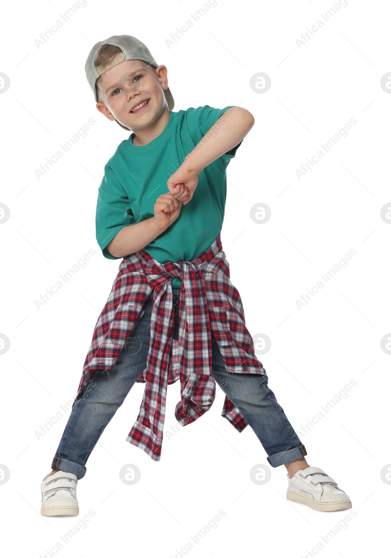 Happy little boy dancing on white background Photo of Happy little boy dancing on white background