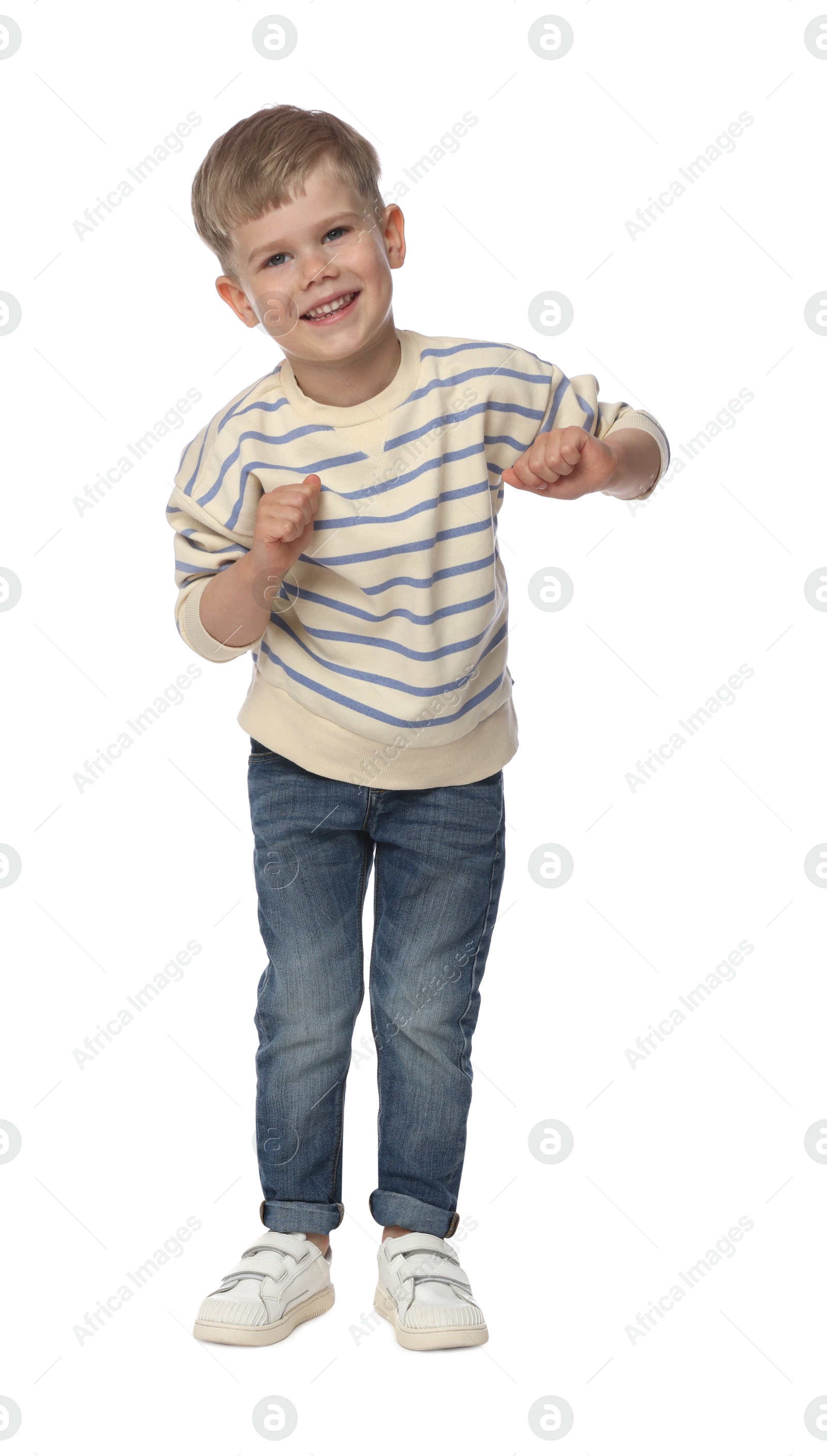 Happy little boy dancing on white background Photo of Happy little boy dancing on white background
