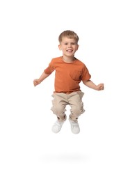 Photo of Happy little boy dancing on white background