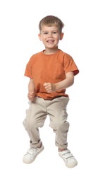 Photo of Happy little boy dancing on white background