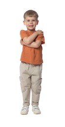 Photo of Happy little boy dancing on white background