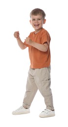 Photo of Happy little boy dancing on white background