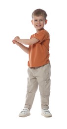 Photo of Happy little boy dancing on white background