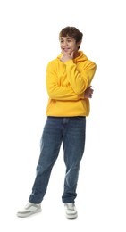 Photo of Happy teenage boy posing on white background
