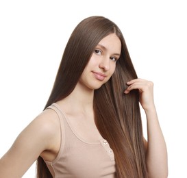 Photo of Portrait of beautiful teenage girl with healthy long hair on white background