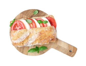 Photo of Tasty sandwich with mozzarella cheese, tomatoes and basil isolated on white, top view