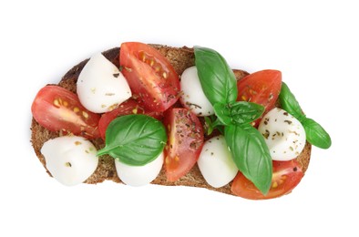 Photo of Tasty sandwich with mozzarella cheese, tomatoes, basil and spices isolated on white, top view