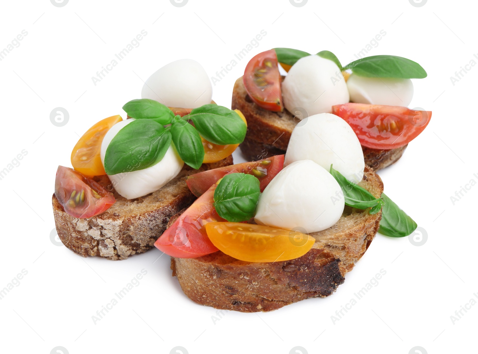 Tasty sandwiches with mozzarella cheese, tomatoes and basil isolated on white Photo of Tasty sandwiches with mozzarella cheese, tomatoes and basil isolated on white