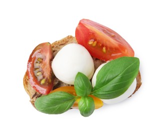 Photo of Tasty sandwich with mozzarella cheese, tomatoes and basil isolated on white, top view