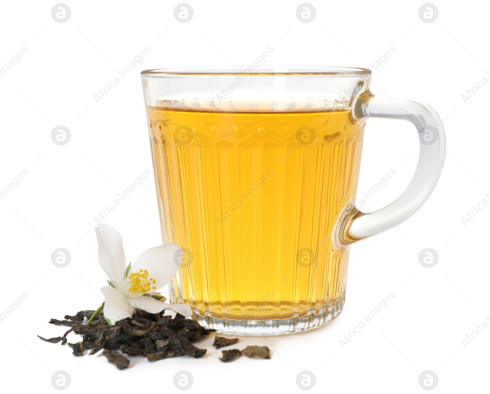 Aromatic jasmine tea in glass cup, flower and dried leaves isolated on white Photo of Aromatic jasmine tea in glass cup, flower and dried leaves isolated on white