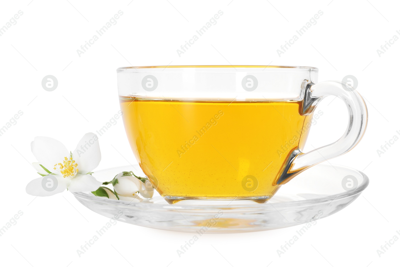 Aromatic jasmine tea in glass cup and flowers isolated on white Photo of Aromatic jasmine tea in glass cup and flowers isolated on white