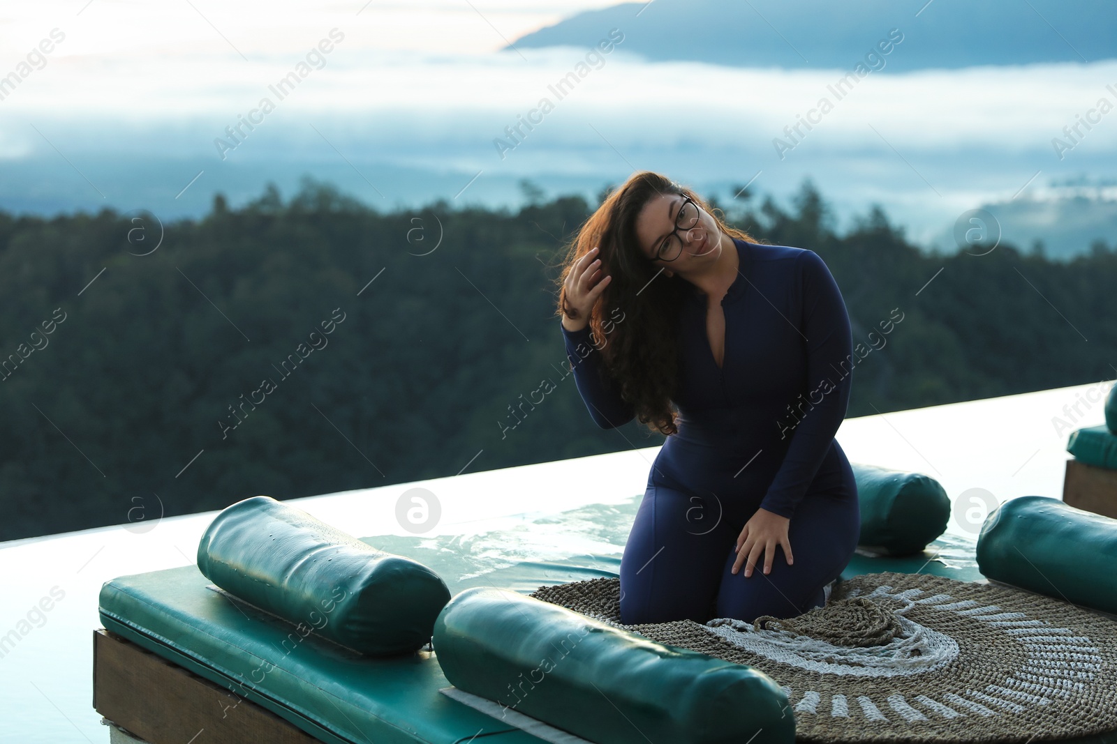 Beautiful woman enjoying picturesque view of mountains. Space for text Photo of Beautiful woman enjoying picturesque view of mountains. Space for text