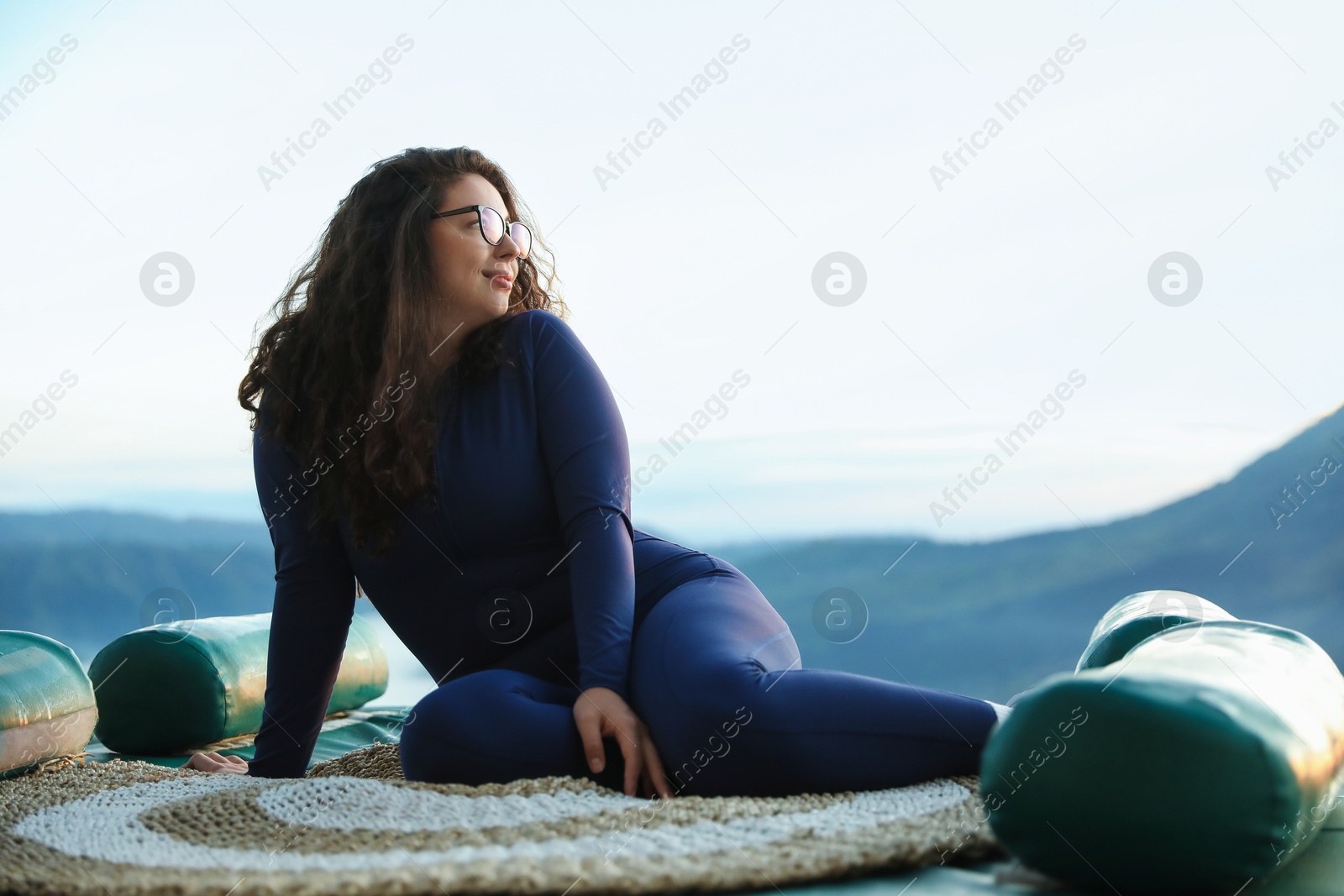 Beautiful woman enjoying picturesque view of mountains. Space for text Photo of Beautiful woman enjoying picturesque view of mountains. Space for text