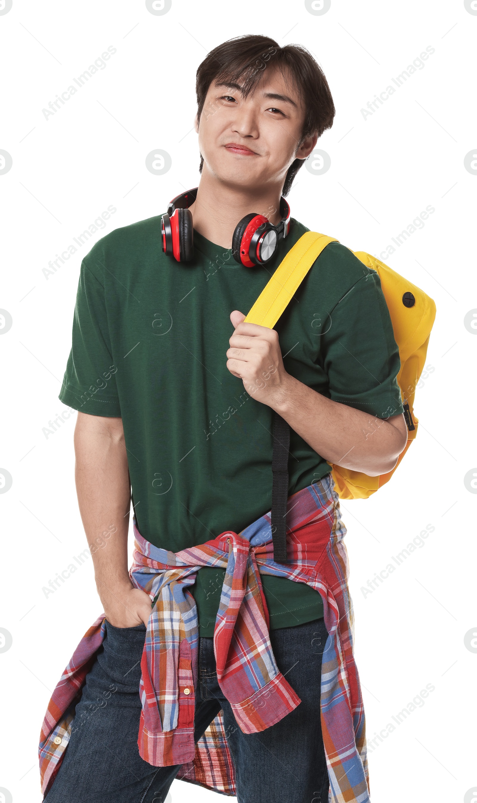 Student with headphones and backpack on white background Photo of Student with headphones and backpack on white background