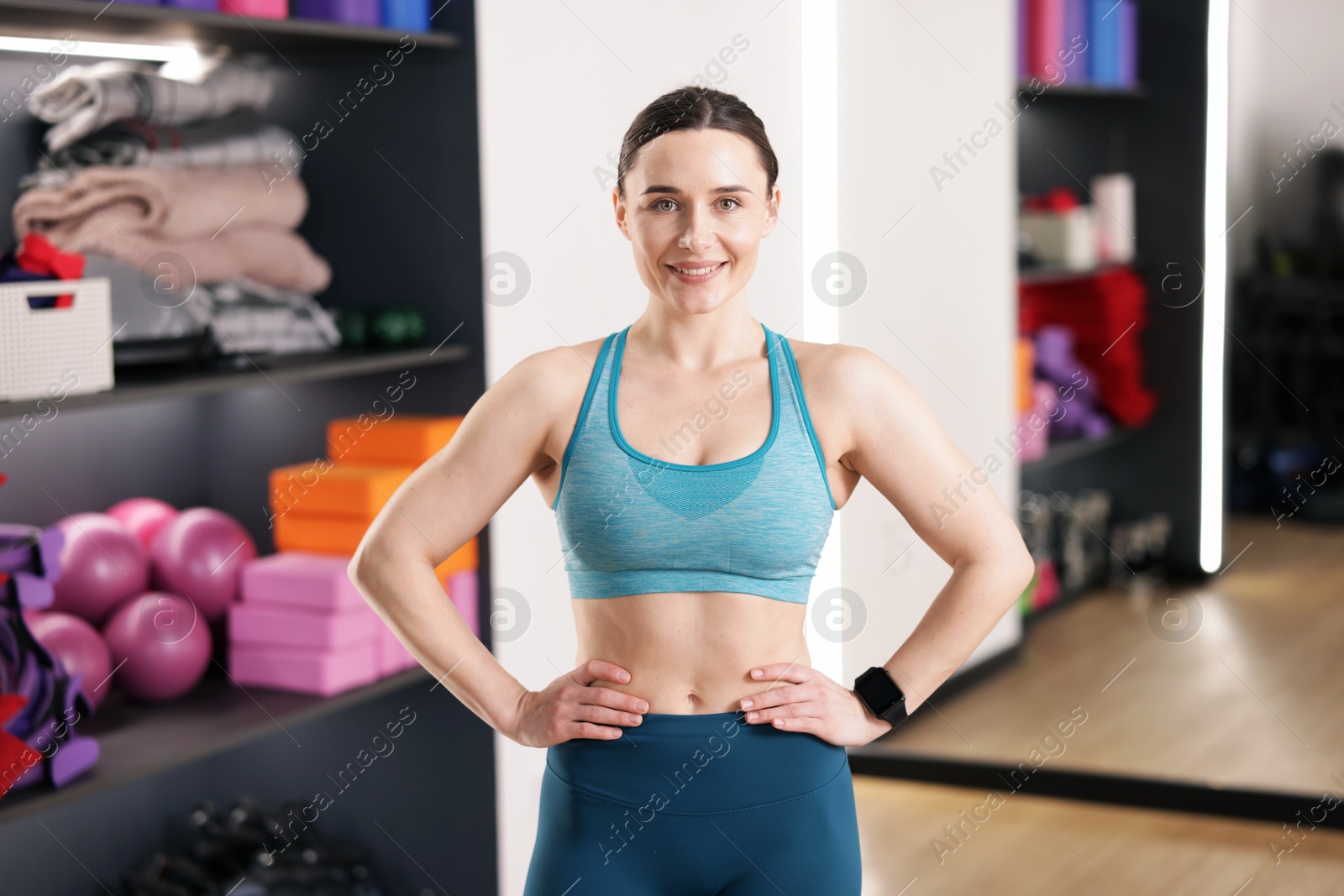 Beautiful woman wearing sportswear in fitness studio Photo of Beautiful woman wearing sportswear in fitness studio