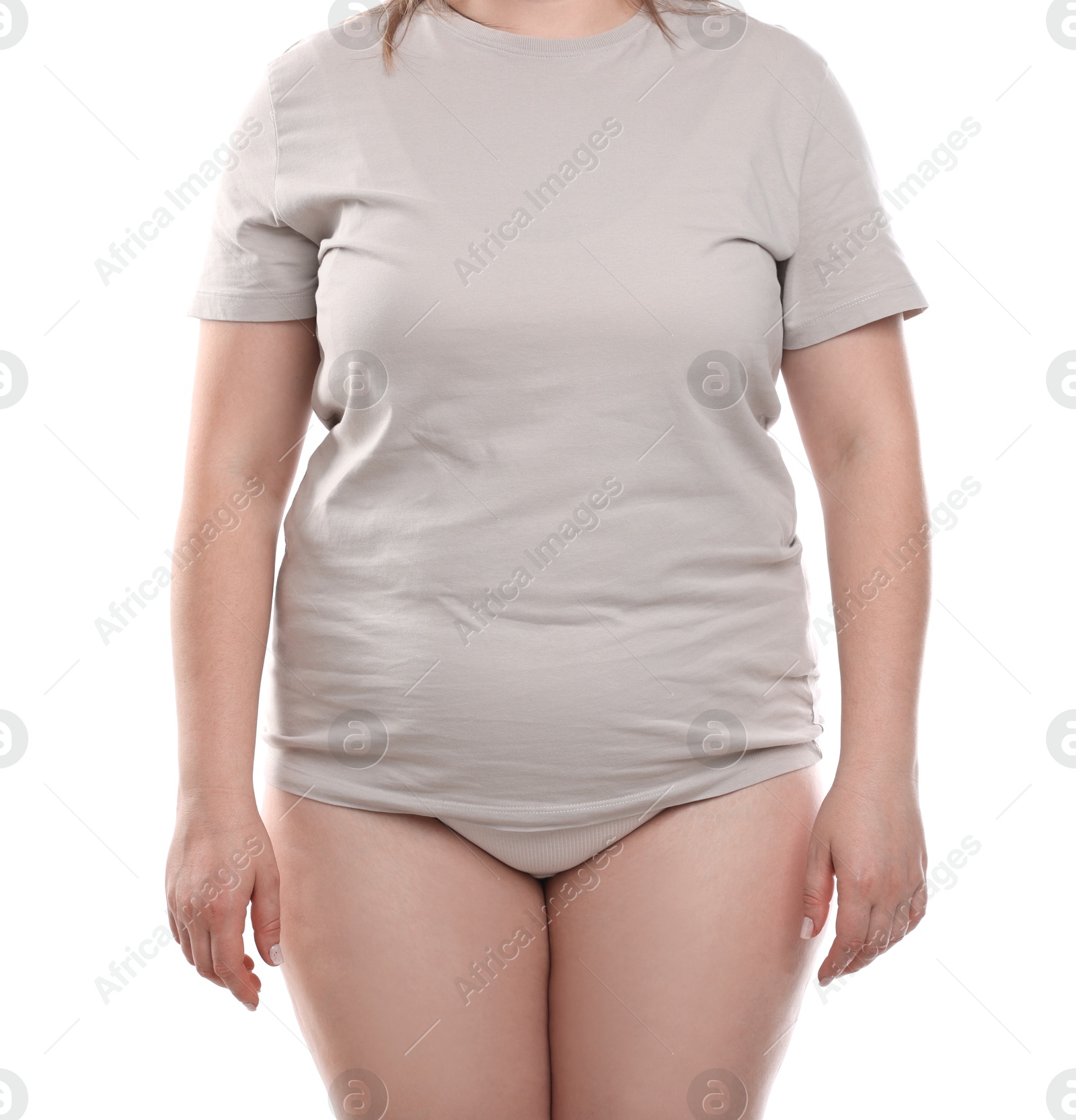 Weight loss. Plus size woman on white background, closeup Photo of Weight loss. Plus size woman on white background, closeup
