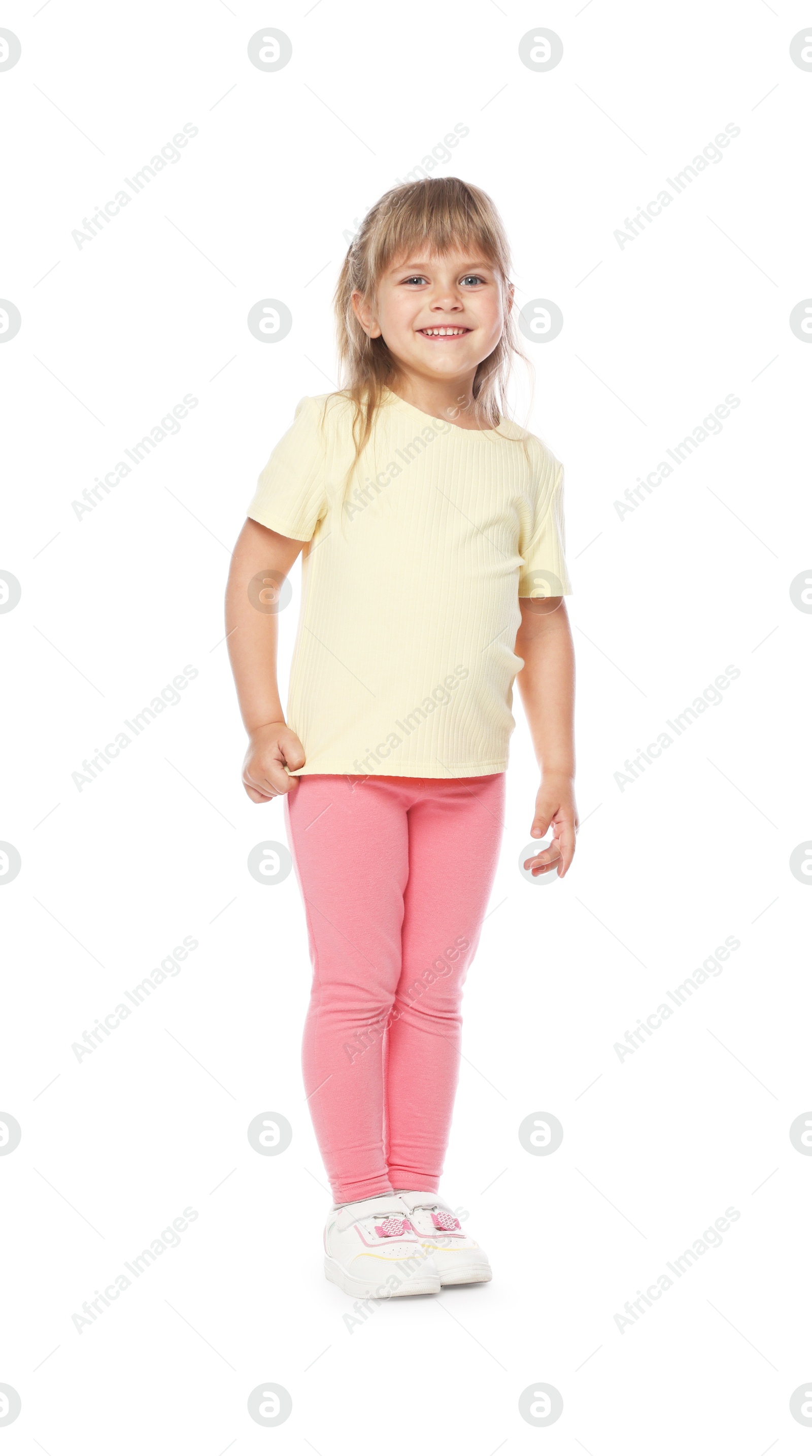 Happy little dancer posing on white background Photo of Happy little dancer posing on white background
