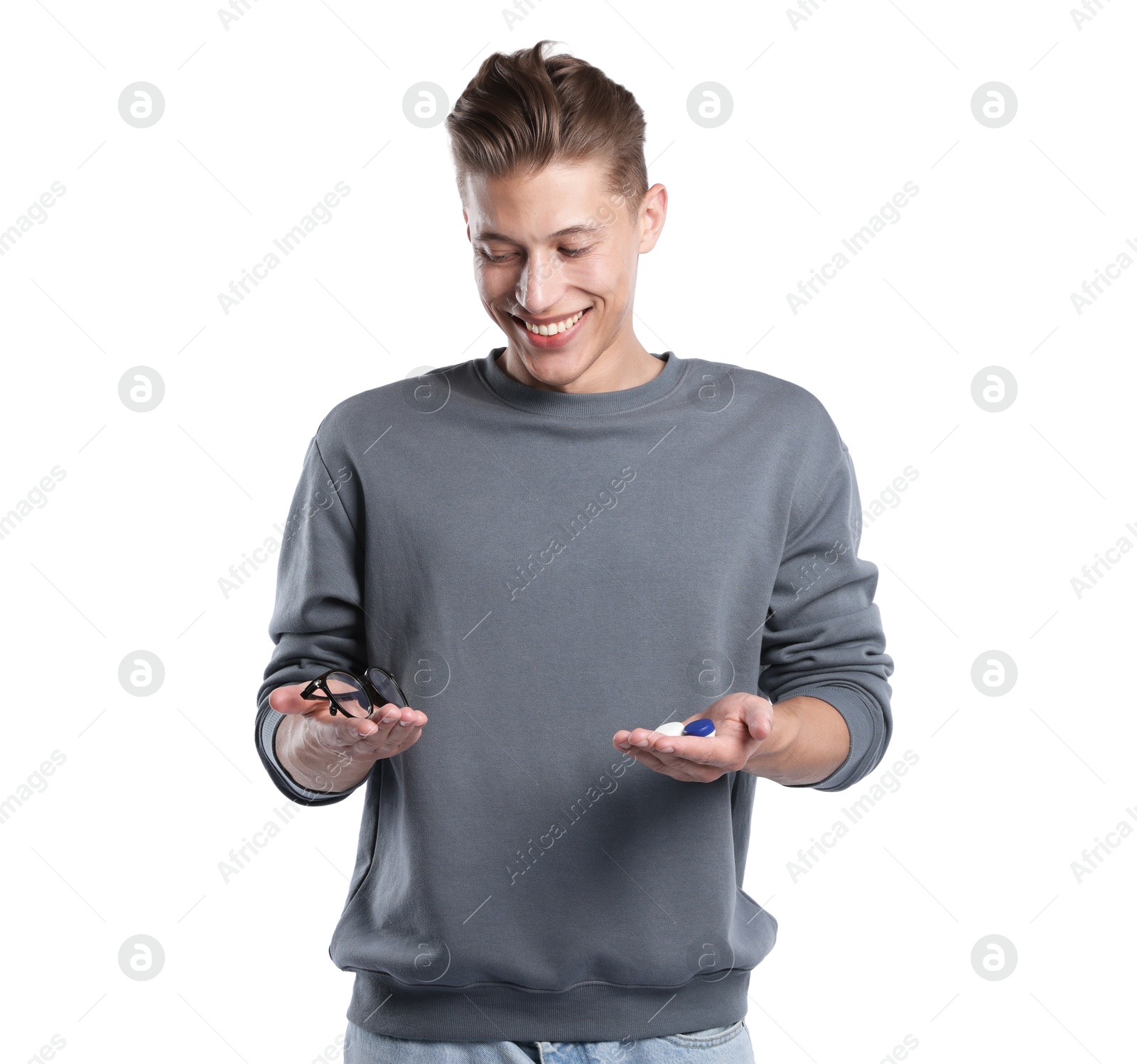 Man choosing between glasses and contact lenses on white background Photo of Man choosing between glasses and contact lenses on white background