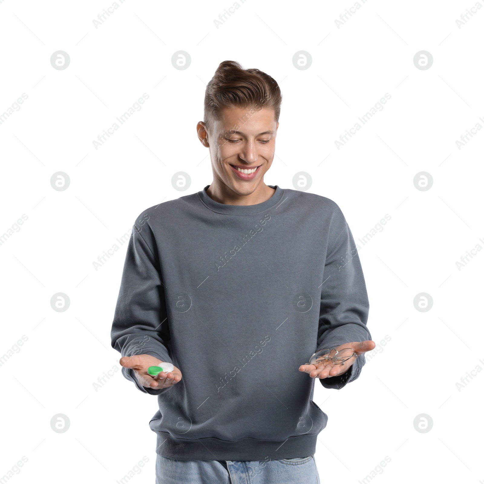 Man choosing between glasses and contact lenses on white background Photo of Man choosing between glasses and contact lenses on white background