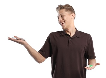 Photo of Man choosing between glasses and contact lenses on white background