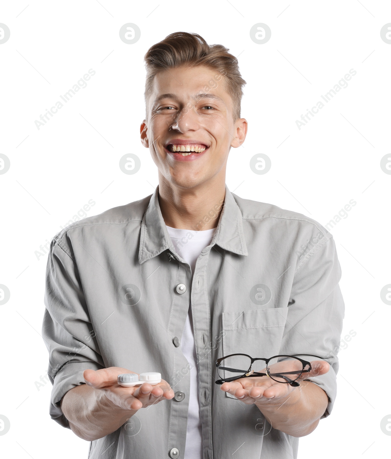 Man choosing between glasses and contact lenses on white background Photo of Man choosing between glasses and contact lenses on white background