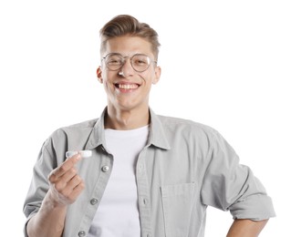 Photo of Man choosing between glasses and contact lenses on white background