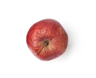 Photo of One whole rotten apple isolated on white, top view