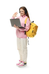 Photo of Teenage girl waving during video call on white background