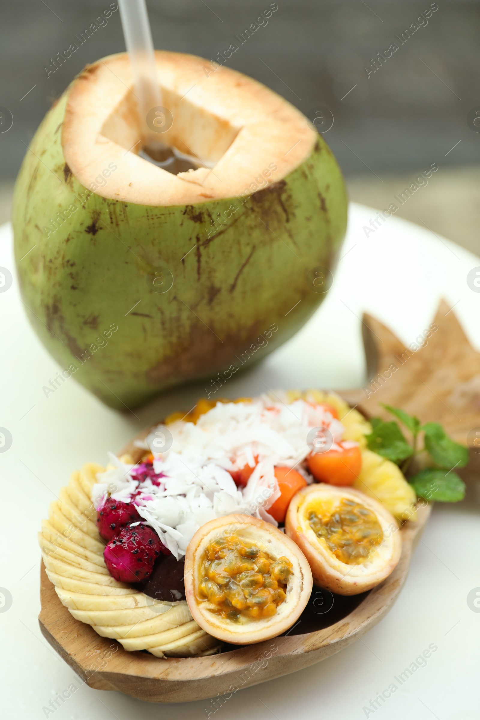 Different fresh fruits on white table, closeup Photo of Different fresh fruits on white table, closeup