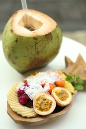 Photo of Different fresh fruits on white table, closeup