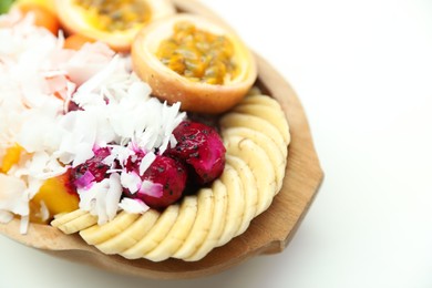 Photo of Different fresh fruits on white table, closeup. Space for text