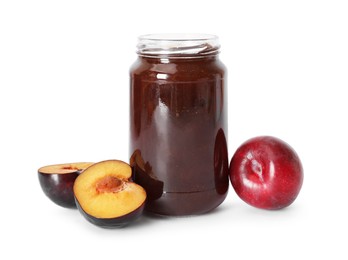 Photo of Sweet jam in jar and plums isolated on white