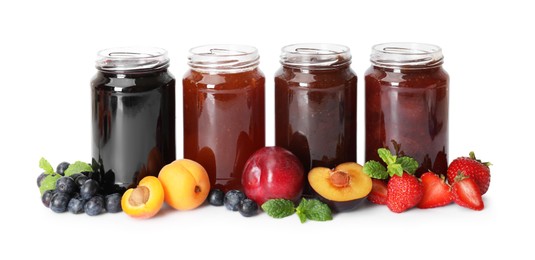 Photo of Different jams in jars and ingredients isolated on white